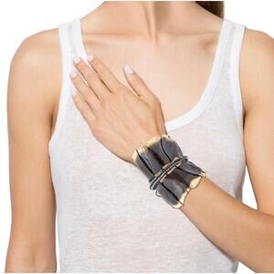 Lanvin gold toned leaf cuff bracelet with Swarvoski crystal accents.